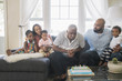 © Hello Lovely/Blend Images - African American family celebrating birthday
