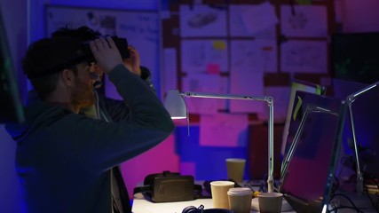Wall Mural -  Young computer programmers trying out virtual reality viewers