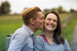 © wernerimages - man kissing woman on her cheek
