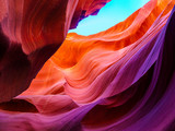Fototapeta  - Colorful waves on the rocks