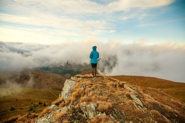 Poster - Hiker walking in autumn mountains