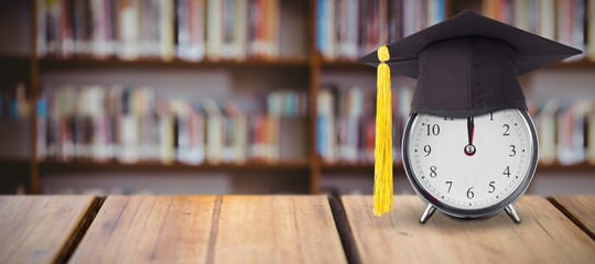 Poster - Composite image of mortar board on alarm 