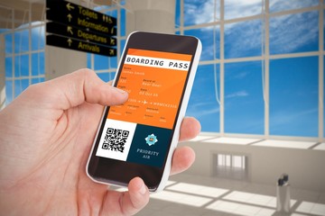 Poster - composite image of cropped hand of man using smartphone