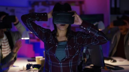 Wall Mural -  Young computer programmers trying out virtual reality viewers