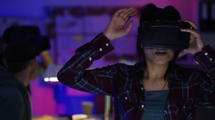 Wall Mural -  Young computer programmers trying out virtual reality viewers