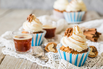 Wall Mural - Carrot cake cupcakes with butter cream frosting