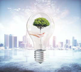 Aufkleber - Hand holding tree inside lamp