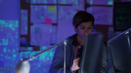 Wall Mural -  Team of young computer hackers trying to gain access to a computer system