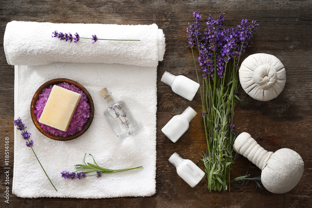 Beautiful spa composition with lavender on wooden background