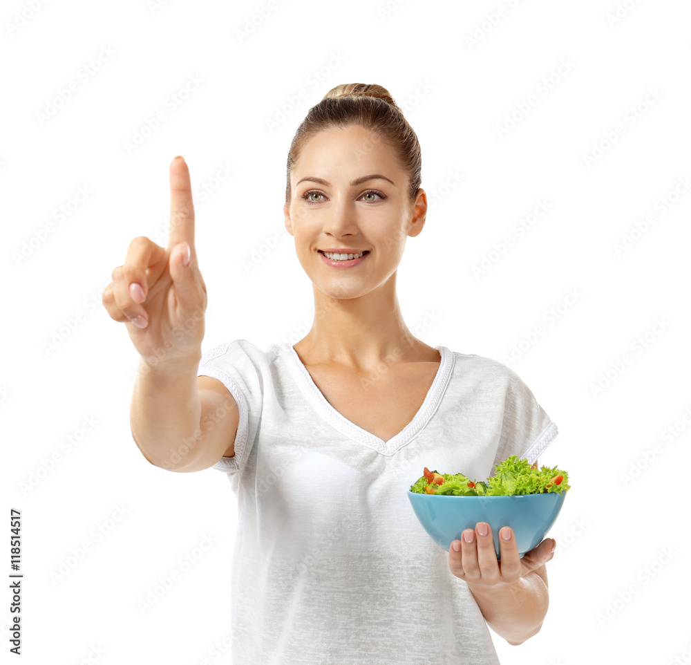 Beautiful girl with salad pointing finger, isolated on white