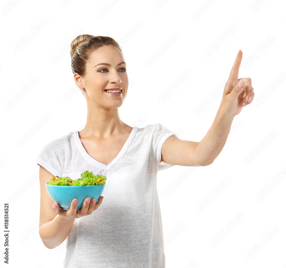 Beautiful girl with salad pointing finger, isolated on white