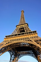 Close Up Eiffel Tower In Summer Sunny Day With Clear Blue Sky Background...Paris, France