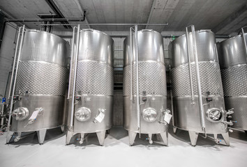 Wall Mural - Metal tanks for wine fermentation at the manufacture