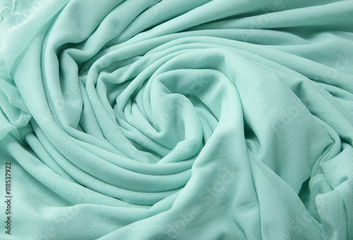 Fotografie, Obraz A full page close up of a swirl of green chiffon fabric texture