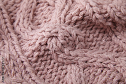Plakat Pełna strona bliska pastelowych różowy sweter z dzianiny tekstury tkaniny