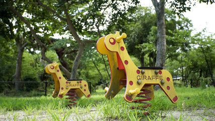 Giraffe toys swing chair in the park 8