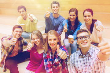 Poster - group of smiling students with paper coffee cups