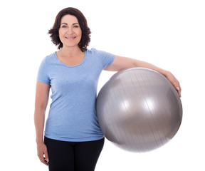 Wall Mural - portrait of mature woman with fitness ball isolated on white