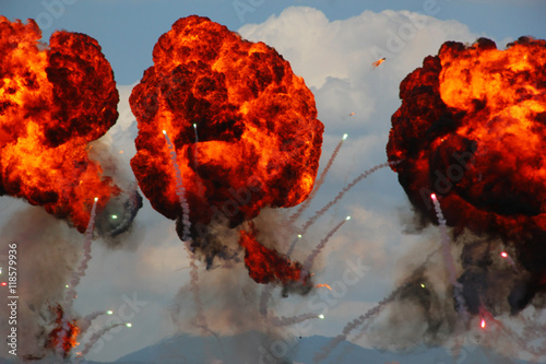 Explosions as part of a demonstration at an air show Poster