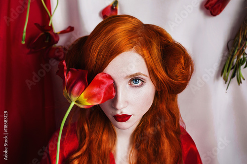 Red Haired Girl With Blue Eyes And Pale Skin In A Red Coat Woman
