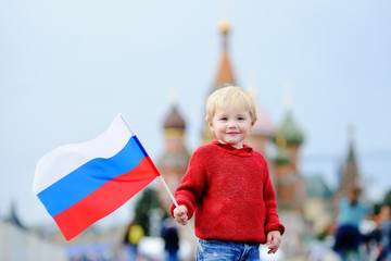 Wall Mural - Toddler boy holding russian flag