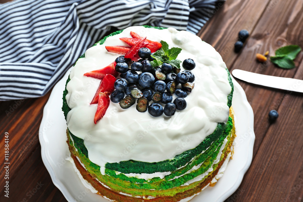 Delicious cake with berries, closeup