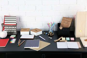 Wall Mural - Office and school set with stationery and notebooks on a table