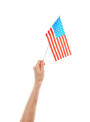 Wall Mural - Male hand holding American flag, isolated on white