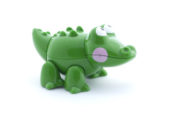 Toy crocodile on a white background