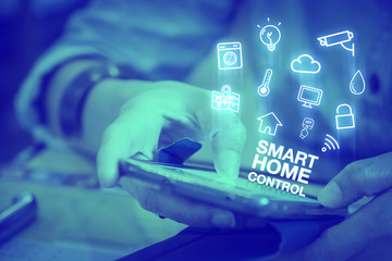 Poster - Close up woman using mobile phone with Smart home control word a
