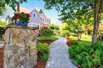 american craftsman house exterior. nice landscape design around.