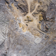 Aerial view over the building materials processing factory. Sand