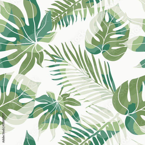 Fototapeta do kuchni Tropical exotic flowers and plants with green leaves of palm.