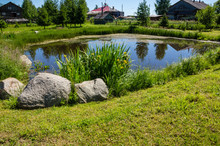 Small Man-made Pond On A Summer Day