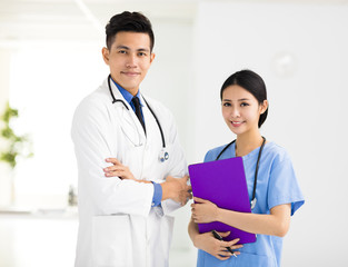 smiling Medical doctors working in the office