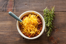 A Hot Bowl Of Spicy Organic Vegetarian Chili With Melted Cheese