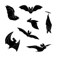 Isolated Silhouettes Of Bats.
