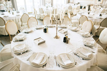 Elegant Table Arrangement And Catering At Wedding Reception. White Style
