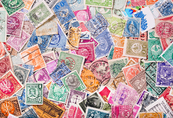 Wall Mural - Old postage stamps from various countries