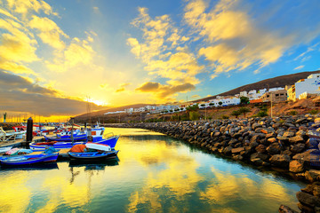 Wall Mural - Sunset over a port in Gran Tarajal, Fuerteventura, Canary islands