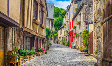 Traditional Houses In Narrow Alley In An Old Town In Europe