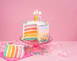 Colorful Birthday Cake over pink