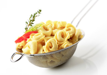 Wall Mural - Stuffed pasta in a sieve