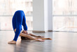 © Tinatin - Woman practicing yoga
