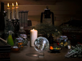 Mystical still life - the magic ball, candles, herbs. Many  items and utensils alchemist. Concept - , witch board, alternative medicine, occult  witchcraft. Halloween