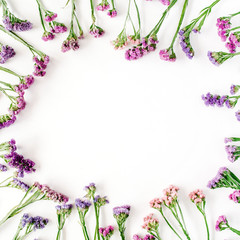 Wall Mural - frame with dried flowers on white background. autumn flat lay wallpaper, top view