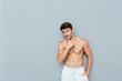 © Drobot Dean - Portrait of handsome shirtless athletic young man