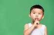 © leungchopan - Little boy making a hush pose