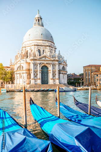 Venice cityscape view on Santa Maria della Salute basilica with gondolas on the Poster