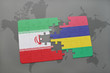 puzzle with the national flag of iran and mauritius on a world map background.